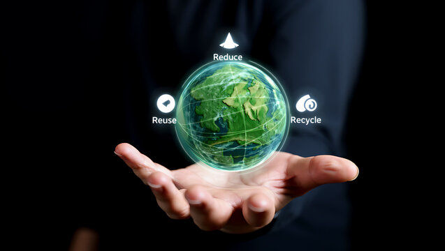 The concepts of reducing reusing and recycling displayed with a digital earth in hand.