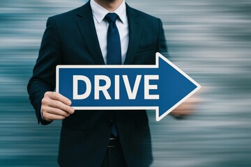 A business professional demonstrates strategy and decision-making by holding a directional sign amid blurred motion symbolizing drive and leadership in a dynamic work environment