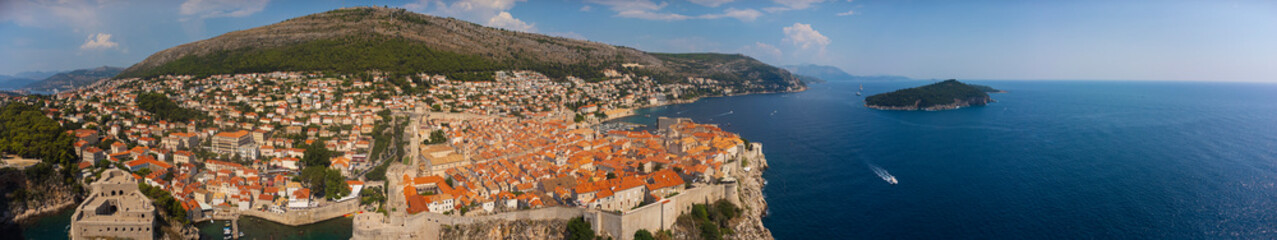 Aerial panorama of the coastal city of Dubrovnik. High angle view of the Croatian coast and the old town summer tourist attraction