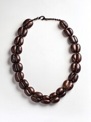 Obraz premium Coffee-inspired necklace showcases unique design with aromatic beans crafted in a stylish accessory perfect for any coffee lover