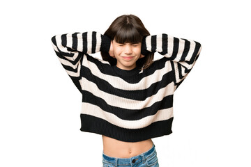 Little girl over isolated green chroma key background frustrated and covering ears