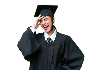 Young university graduate  caucasian woman over isolated background has realized something and...