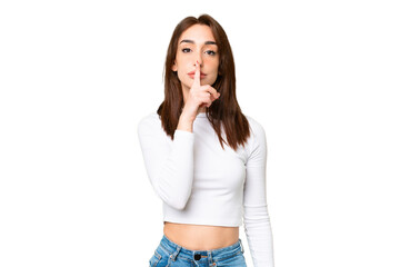 Young caucasian woman over isolated chroma key background showing a sign of silence gesture putting...