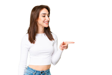 Young caucasian woman over isolated chroma key background pointing finger to the side and presenting a product
