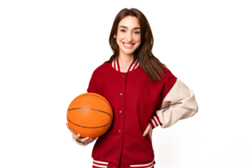 Young basketball player woman over isolated chroma key background posing with arms at hip and smiling