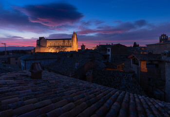 Duomo di Orvieto at sunrise. Orvieto roofs from above