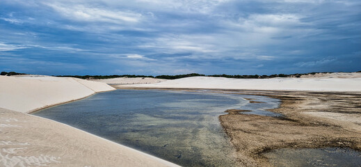 Dunes and lagoons of lagoa bonita, Lencois Maranhenses, Barreirinhas, Brazil. White sand dunes with pools of fresh water