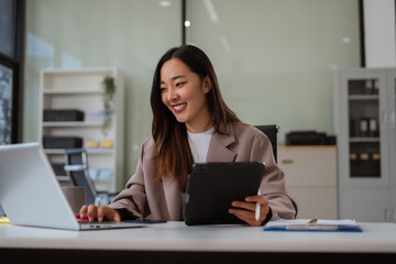 Businesswoman analyzing financial graphs, calculating company expenses, and planning investments,...