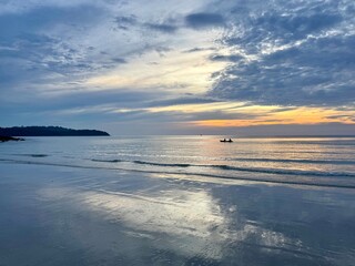 view of the beach at sunset