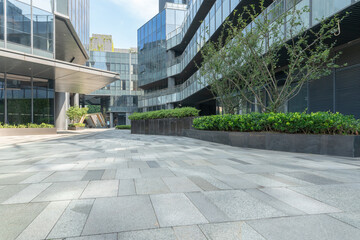 empty road in front of modern office building in the city