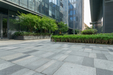 empty road in front of modern office building in the city