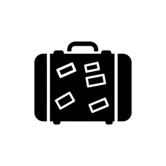 Suitcase with travel stickers representing world travel and adventure