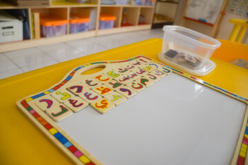 wood toys at pre school classroom. Kindergarten education smart games for children