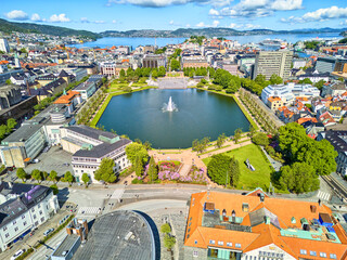 Aerial drone shot of the center of Bergen with small lake and park, Norway