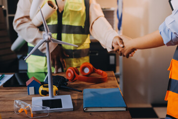 Engineers are helping to design work on blueprints and collaborate on structural analyzing of project types.