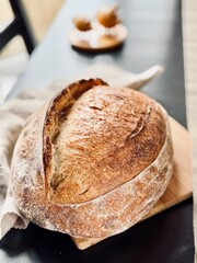  freshly baked sourdough bread with a textured, golden crust.