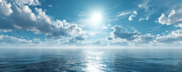 Fototapeta premium Calm ocean blue waters reflect bright sunlight under a clear sky with fluffy clouds in a serene tropical scene