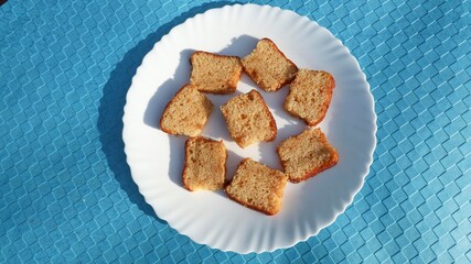 Tasty leomn cake in citrus flavour. Fluffy slices of spong cake breakfast in white plate