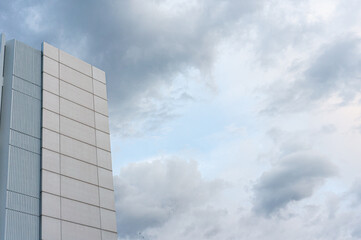 clouds in the sky with big building