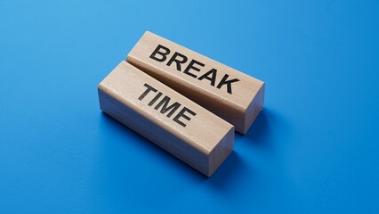 Break Time symbol. Concept word Break Time on wooden blocks. Business and Break Time concept. Copy space.3D rendering on blue background.