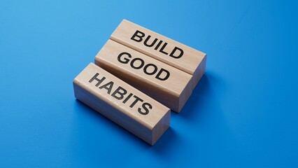 Build good habits symbol. wooden blocks with words Build good habits.Business and Build good habits concept. Copy space.3D rendering on blue background.
