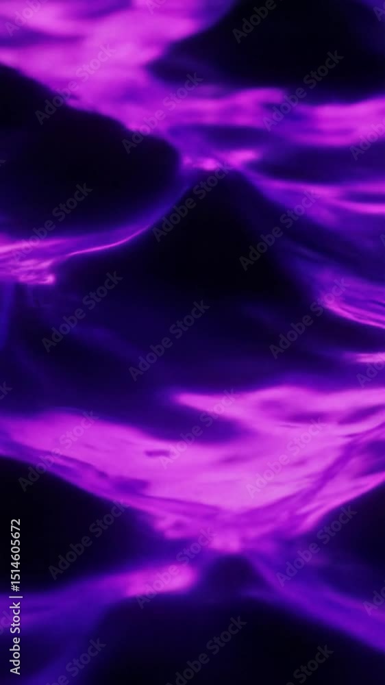 Poster extreme close-up macro video of a glossy, reflective deep purple liquid surface with dynamic ripplin