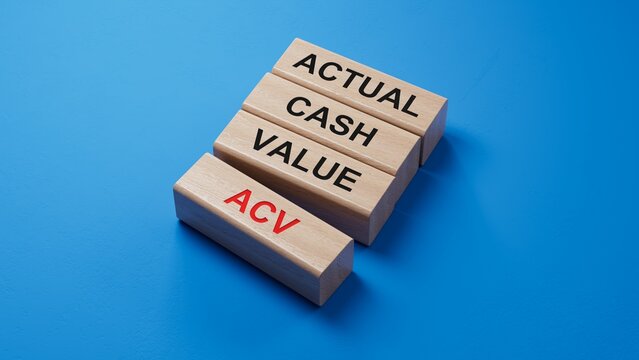 ACV actual cash value symbol. Concept words ACV actual cash value on blocks . Business and ACV actual cash value concept. Copy space.3D rendering on blue background.