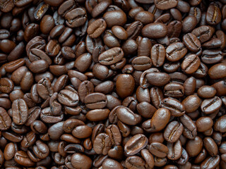 Roasted coffee beans background.