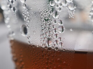 Water drops on a glass of cold coffee
