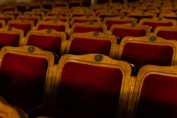 Obraz premium Row of red seats in theatre