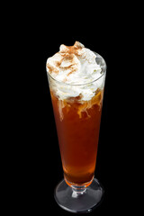 Non-alcoholic cocktail with crushed ice, cherry topping and orange jui