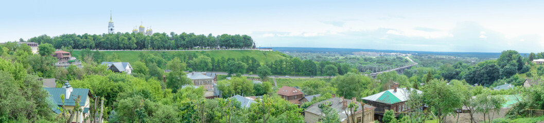 Panorama of an old small town on a hill.
