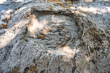 Manual concrete mixing with sand, cement and water, using shovel and trowel on outdoors