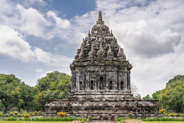 Travel landscape view of ancient Candi Bubrah buddhist stone temple in Prambanan temple compounds, Klaten, Central Java, Indonesia
