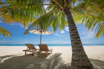 Beautiful panoramic sea sand sky. Tropical relax beach sunny summer island landscape. Love couple chairs umbrella palm leaves romantic coast. Luxury travel destination. Honeymoon vacation best holiday