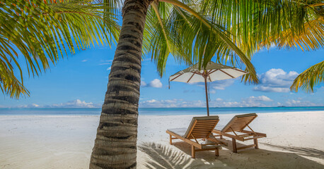 Beautiful panoramic sea sand sky. Tropical relax beach sunny summer island landscape. Love couple chairs umbrella palm leaves romantic coast. Luxury travel destination. Honeymoon vacation best holiday