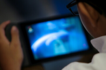 A person is using a tab to browse communication technology