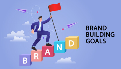 A businessman placing a red flag on colorful blocks spelling “BRAND,” symbolizing brand development, marketing strategy, and corporate identity.