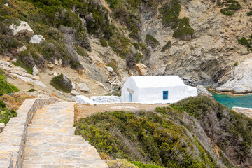 Whitewashed chapel at Agia Anna beach on Amorgos island. Cyclades, Greece