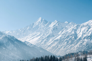 majestic caucasian peaks illuminated by ultrabright sunlight showcasing their grandeur and beauty