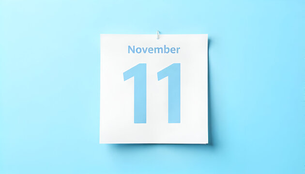 Calendar page displaying "November 11" on a clean blue background. Lāčplēsis day,