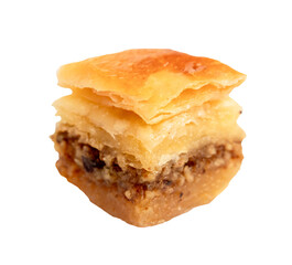 piece of armenian baklava cut out on white