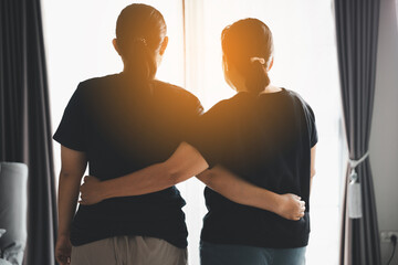Hope and trust with crisis concept. Closeup, love and holding hands for support, comfort and care with grief, loss and empathy. people and family with compassion, sympathy and healing with bonding.