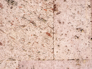 wall of building from pink armenian tuff stone