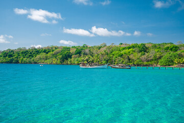 Beautiful tropical beach at exotic island with palm trees