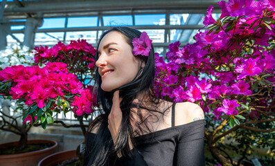 portrait of a woman with flowers in her hair, smiling