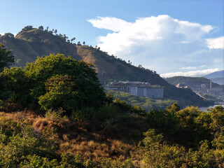 Labuan Bajo, Indonesia - 28 May 2025: Seaside row of luxury beachfront resorts in Labuan Bajo, Indonesia, tropical coastal architecture and ocean view