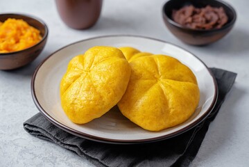 Pumpkin steamed buns with red bean paste filling