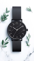 Black Minimalist Wristwatch on Marble Surface with Greenery