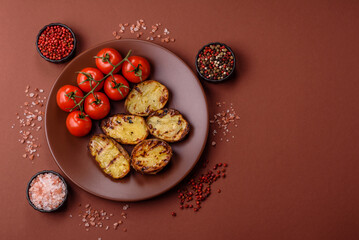 Food, potatoes cut in halves or slices grilled. Cooked baked potatoes